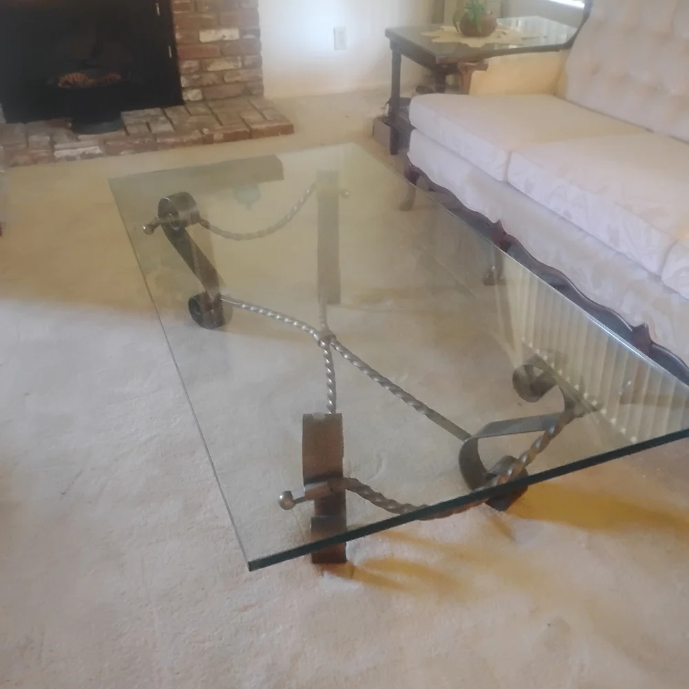 Elegant Glass Coffee Table with Black Metal Accents